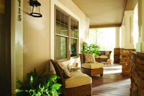 Living room with fiberglass-reinforced vinyl windows installed by Thermal King