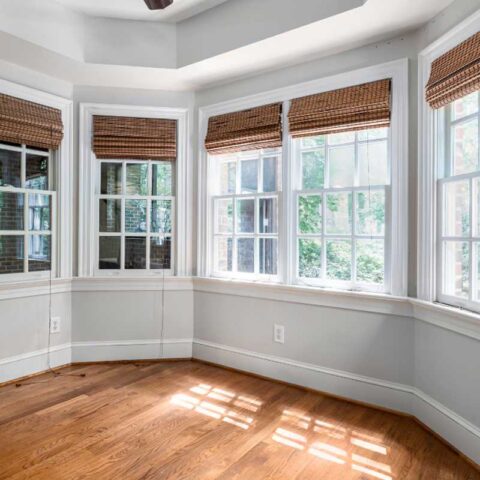 Sunlit room with energy-efficient, low-maintenance vinyl replacement windows